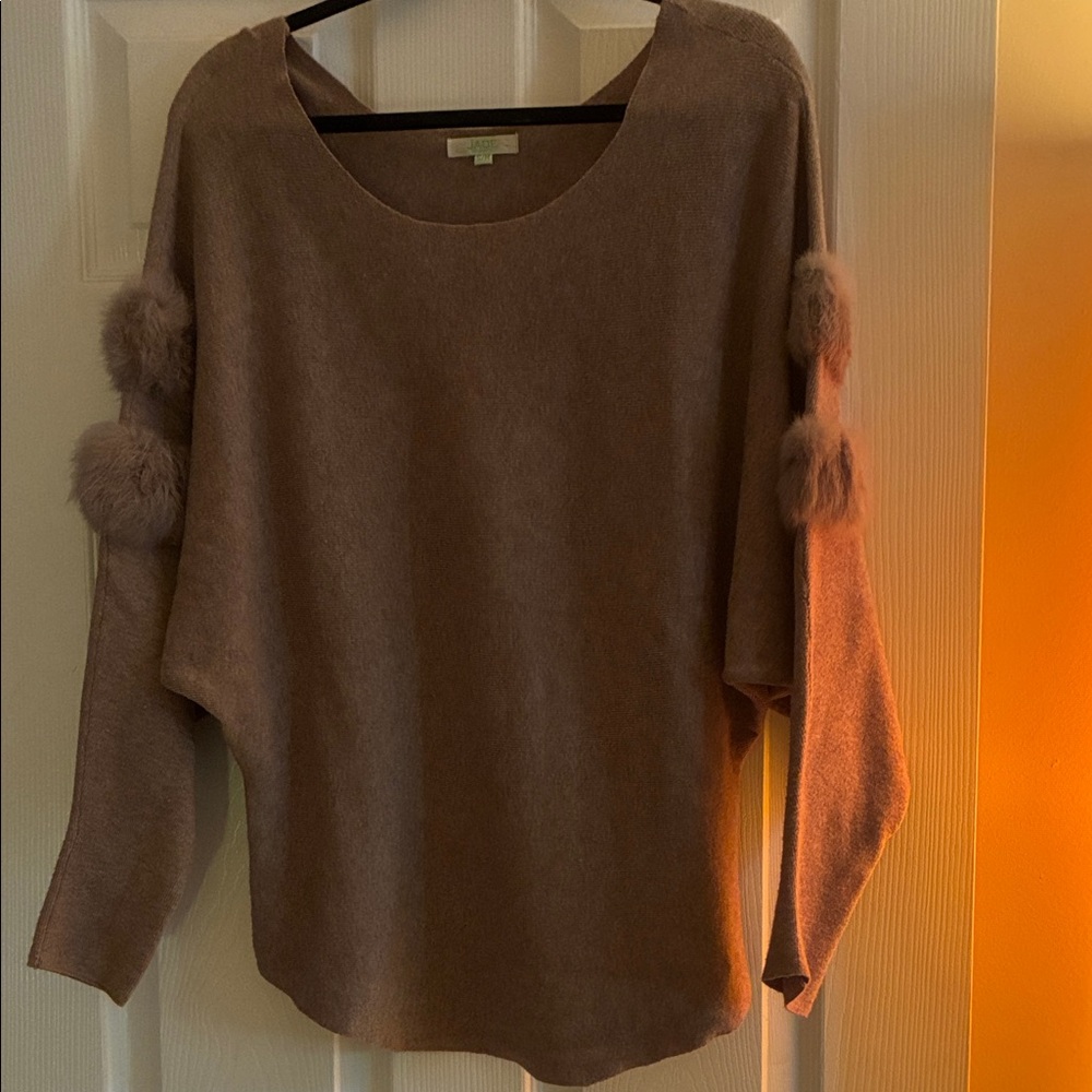 Gorgeous off shoulder sweater with fur accents in sleeves. Totally retro.